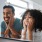 father and daughter look in the mirror together